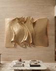Warm spotlight reflection casting dramatic architectural shadows on 3D sculpted textured wall art