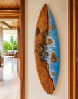 Natural wood and blue resin ocean wall art with stone details
