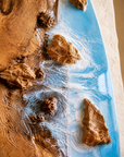 Surfboard-inspired wood resin wall art for luxury interiors