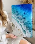 Turquoise ocean resin wall art in modern home interior